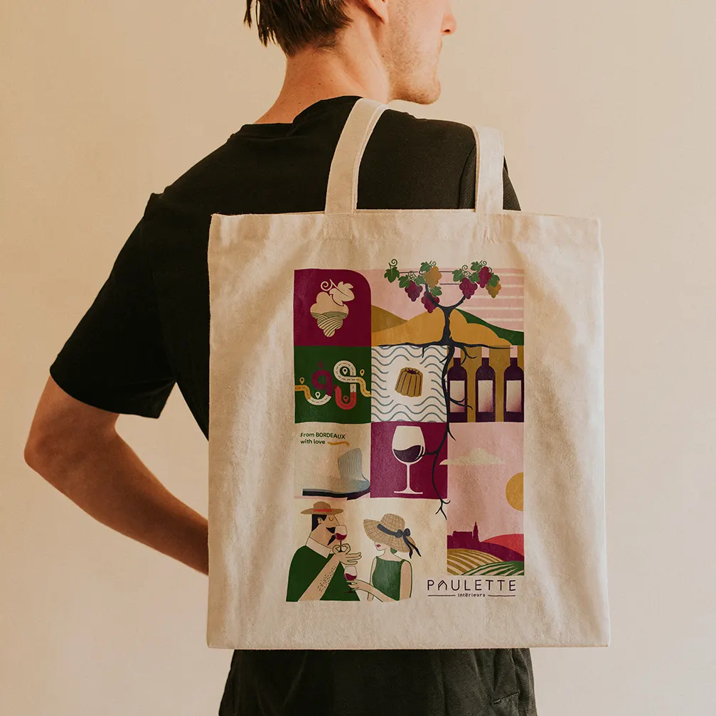Tote bag d'un motif personnalisé pour une entreprise spécialisée dans le tourisme œnologique.