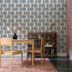 Papier peint écologique au style graphique avec ses demi cercles blancs formant un quadrillage bleuté.